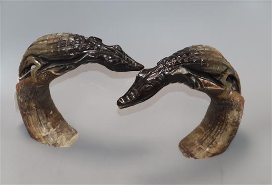 A pair of crocodile horn carvings height 22cm